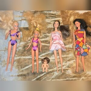 Lot of Vintage Fashion Dolls in Pink and Purple